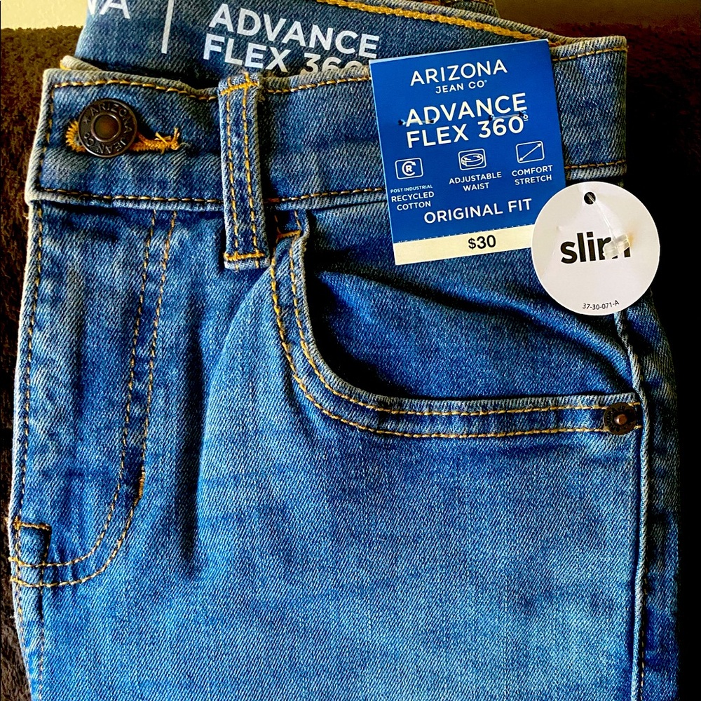Kids brand new size 12, Arizona blue Jeans with tags still attached.